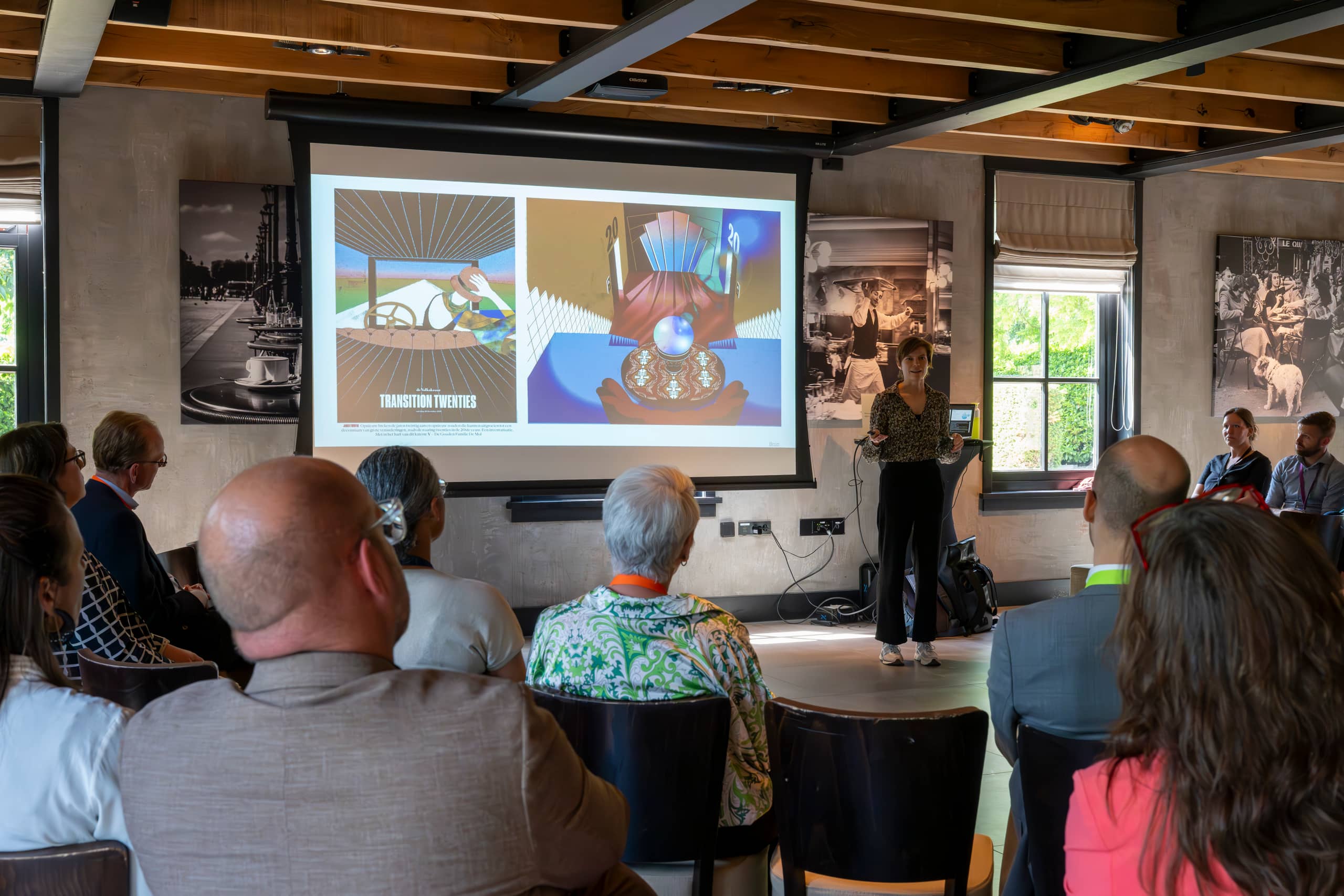 Subsessie met publiek en groot scherm over transitie